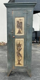 Very nice contemporary country cupboard in nice blue paint, with carved birds inset on door panels,