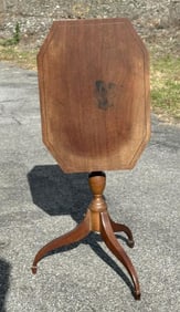 19th c mahogany tilt top stand with birdcage pivoting on back, has old stain on top and some wear to