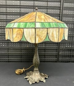Circa 1910 leaded glass table lamp, with iron base. From local estate, Has (3) larger slag panels