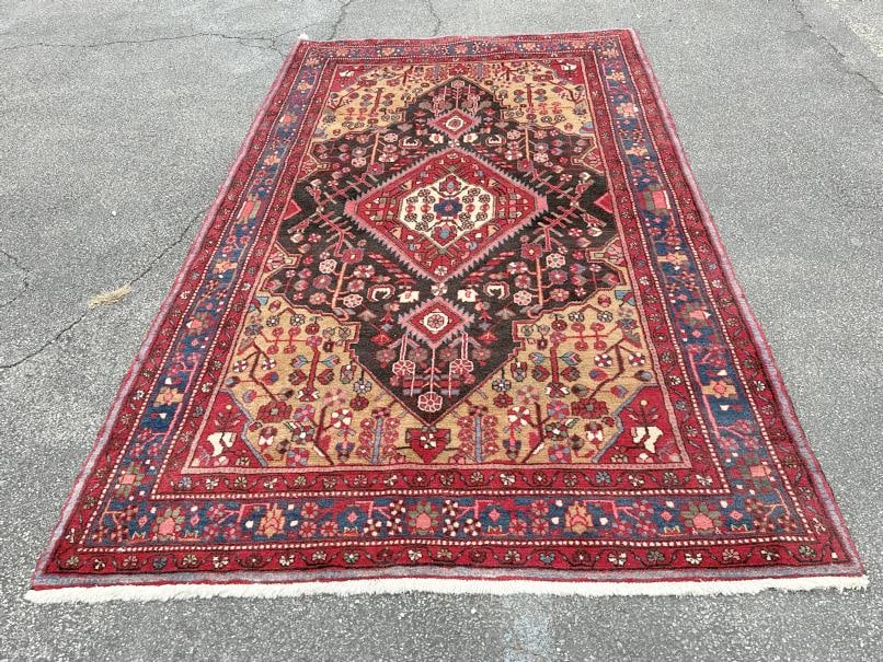 Vibrant handmade oriental wool rug, nice thick pile, wonderful condition, measures 114.5" x 64". (1 of 3)