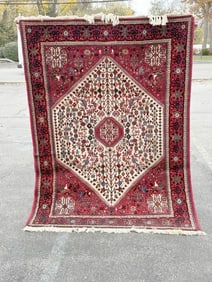 Handmade wool oriental rug, thick pile, very nice condition, measures 6'8" x 4'....From a Boston,