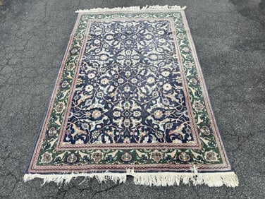 Handmade wool oriental rug, good estate condition, measures 94.5" x 64.5". From nice non smoking