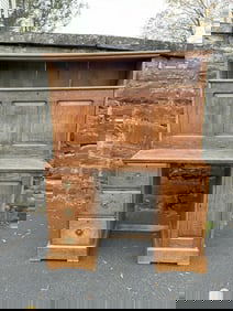 Circa 1900 oak drop front desk with open shelf and drawers, probably used in an office setting, from