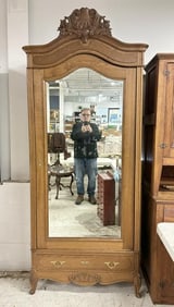 Nice single door oak armoire with beveled glass mirror on the door, from fine Boston, Mass home. Has