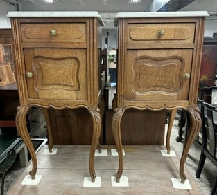Circa 1920 pair of decorative oak marble top stands, in very nice clean condition, structurally
