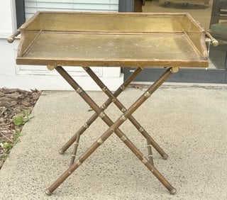 Vintage lift top decorative tray table with brass surface, lifts off, base is like a luggage holder