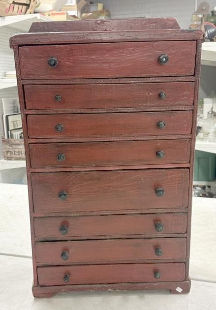 Older red painted (8) drawer countertop storage cabinet, paint peeling on the top, has compartments (1 of 3)