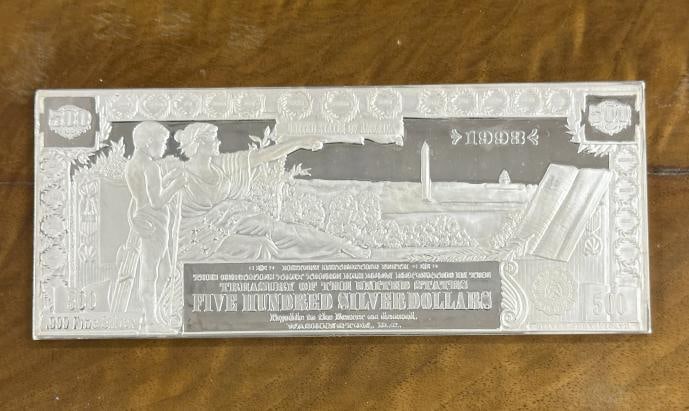 1993 FIVE HUNDRED SILVER DOLLARS half pound fine silver bar. From a local home, in plastic case, (1 of 2)