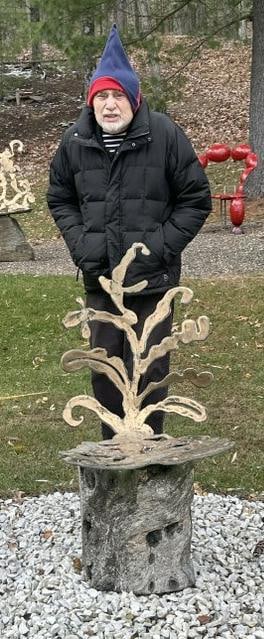 Alan Siegel (born 1938 ) bronze casted chair on wood tree stump base, directly from the Woodstock, (1 of 5)