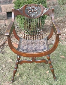 Carved mahogany circa 1910 spindle back armchair with carved face on back, from fine Kingston, N.Y.