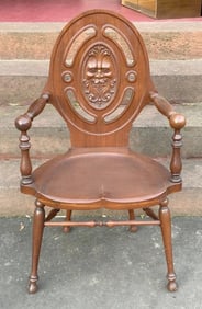 Unusual form carved mahogany armchair with Northwind God face on back, from Kingston, N.Y.