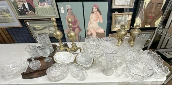 Misc. estate lot older pressed glass, cut glass, brass andirons, 2 brass oil lamps, and spoon board,