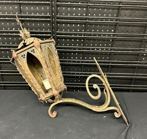 Early hand wrought iron wall sconce with cross on it, most likely from a Monestary, one colored