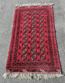 Handmade wool oriental scatter rug, vibrant color, nice estate condition. Measures 73" x 41.5".