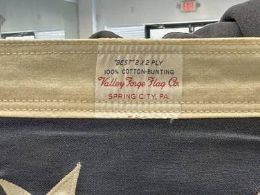 Older 50 star flag, with card, it was given to this gentleman to have draped over his Fathers
