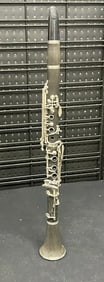 Older clarinet, no case, can't see a Makers name, some light stains on wood body, measures 26.5"