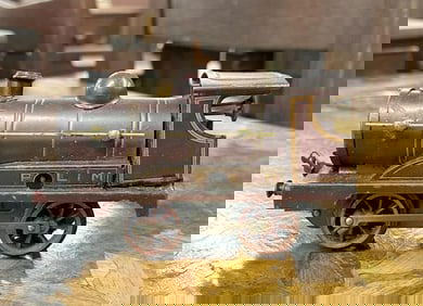 Old HORNBY key wind train engine in as found estate condition, original paint, one side piece is