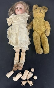Estate lot old jointed teddy bear and busque head doll ( hands and pther parts are there ), bear