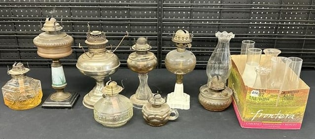 Estate lot older oil lamps and chimneys, good lot for a dealer to sort out…...just as we found