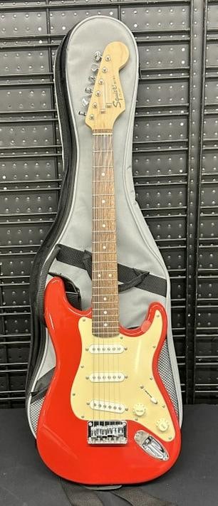 FENDER Squire Minin electric guitar, very nice condition. In Ibanez soft guitar case, Serial Number (1 of 6)