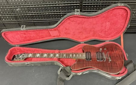 CHARVEL electric guitar in very nice estate condition, wonderful wood graining, and Mother of Pearl