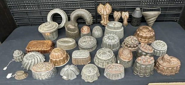 (33) pcs. Old kitchen molds, some copper, some galvinized, one tea can with stenciling in the lot,