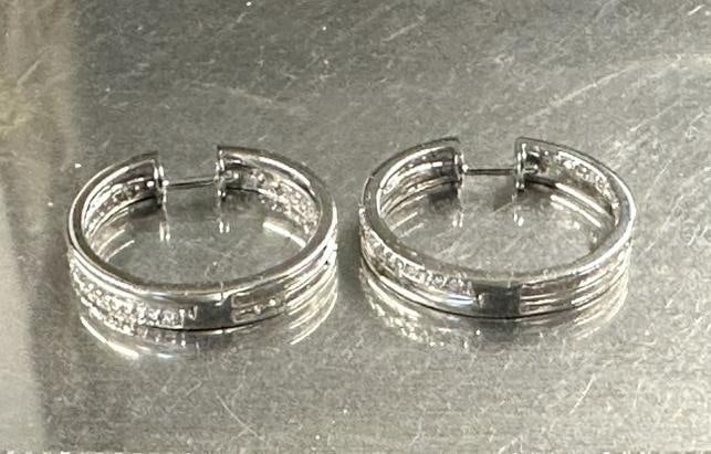 Pair 18K white gold with diamond earrings, nice estate condition, from local estate, total weight is: Pair 18K white gold with diamond earrings, nice estate condition, from local estate, total weight is 6.9 pennyweights.