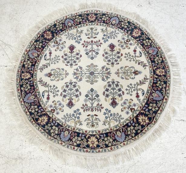 Handmade wool round oriental scatter rug, measures 48" across, nice estate condition. (1 of 2)
