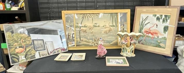 FLAMINGO lot to include ceramic vase, (2) mirrors, and (4) prints, and figurine of woman holding a (1 of 8)