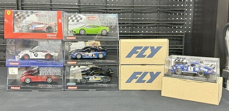 (9) 1/32 scale slot cars all in original boxes, and (3) with boxes, fine condition. From estate (1 of 5)