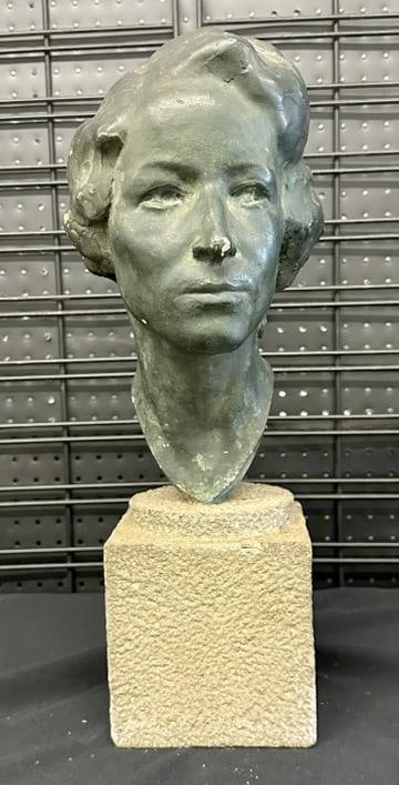 Circa 1920's plaster or terra cotta bust of a Woman on carved stone base, not signed, has a bronze: Circa 1920's plaster or terra cotta bust of a Woman on carved stone base, not signed, has a bronze like patina, a few little scuffs, no damage or repairs, from estate of Charles J. Carlotti.