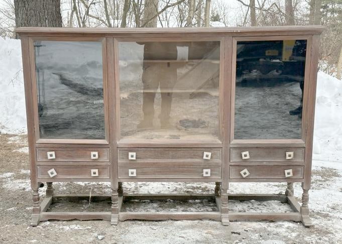 Oak circa 1950's display cabinet, has (6) drawers underneath, kind of a pickled finish, structurally: Oak circa 1950's display cabinet, has (6) drawers underneath, kind of a pickled finish, structurally sound, he housed his rock and mineral collection in it, he cut the shelves on curves for display. T