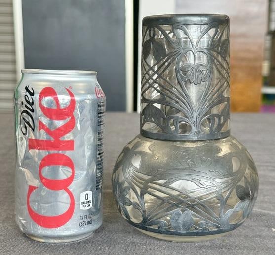 Matching sterling silver overlay decanter and glass, from local estate, very nice condition, great: Matching sterling silver overlay decanter and glass, from local estate, very nice condition, great Nouveau design, decanter measures 5.75" high and glass measures 3.5" high.