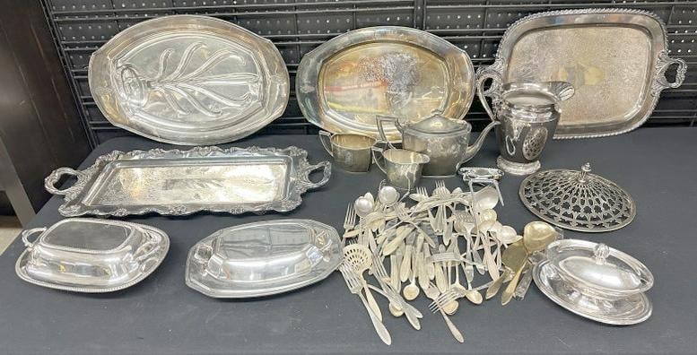 Large estate lot of silverplate to include (4) trays, 2 pc. Tea set, flatware, pitcher, (3) covered (1 of 10)