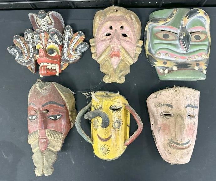(6) carved wood polychromed masks, origins unknown, were hanging all through the estate of Charles (1 of 7)