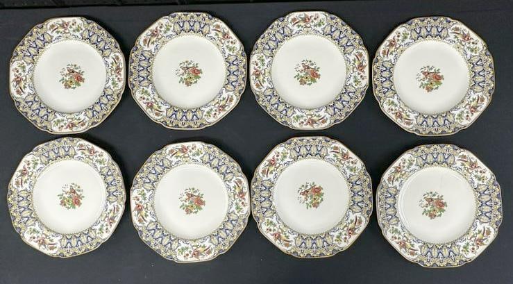 (8) CROWN DUCAL WARE plates with floral and birds decorated. Some crackling in glaze on a few and (1 of 5)