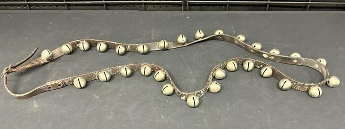 Long strand vintage sleigh bells, all intact and leather intact also, measures approx. 82" long,: Long strand vintage sleigh bells, all intact and leather intact also, measures approx. 82" long, found in local estate.