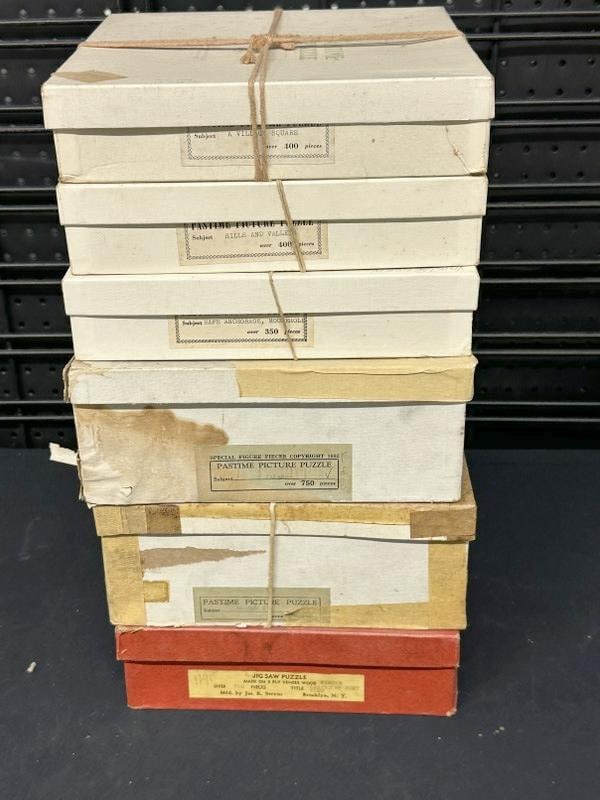(6) early wood puzzles in boxes, all were tied with string around boxes and stored away…..I'll: (6) early wood puzzles in boxes, all were tied with string around boxes and stored away…..I'll picture the titles, I have the feeling they are complete, because everything from this estate is in ord