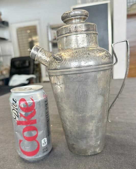 STERLING SILVER 9.75" high cocktail shaker ( has dents on bottom rim ), has monogrammed initials on: STERLING SILVER 9.75" high cocktail shaker ( has dents on bottom rim ), has monogrammed initials on front, from estate in Hudson Valley….weighs 13.22 troy ounces….