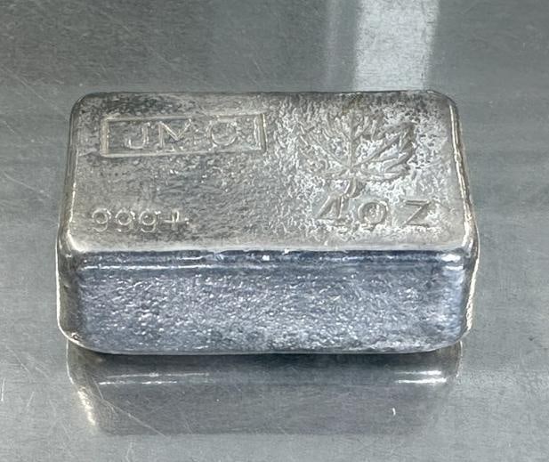 (4) oz. 999 JMC Maple Leaf silver bar, from estate collection we are selling,nice condition.: (4) oz. 999 JMC Maple Leaf silver bar, from estate collection we are selling,nice condition.