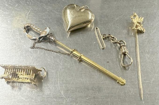 14K estate lot to include charm, sword pin, hear pendant, dragon stick oin and watch chain (1 of 3)