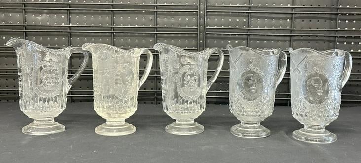 (5) commemorative Admiral Dewey pitchers, (2) different versions, (3) of one, and (2) of the: (5) commemorative Admiral Dewey pitchers, (2) different versions, (3) of one, and (2) of the other…..very nice overall condition, from local estate collection. They measure 9.25" high.