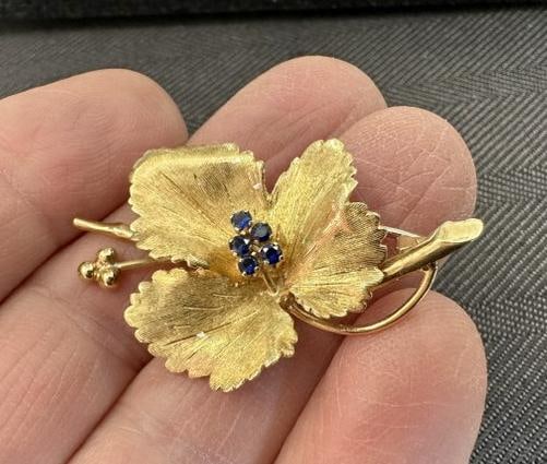 18K leaf pin with saphires, from fine estate in Hudson Valley, marked ITALY….measures approx.: 18K leaf pin with saphires, from fine estate in Hudson Valley, marked ITALY….measures approx. 1.75" long, fine condition, weighs 4.8 pennyweights.