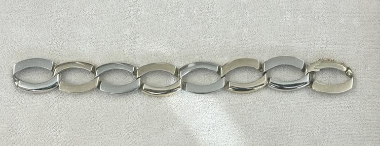 14K two tone bracelet, marked (585 ITALY ), measures 7 3/8" long, fine condition, from fine estate: 14K two tone bracelet, marked (585 ITALY ), measures 7 3/8" long, fine condition, from fine estate in Hudson Valley, weighs 26.2 pennyweights.