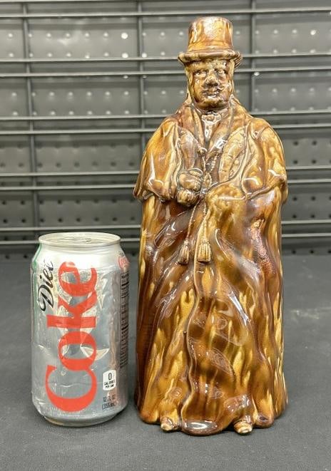 Bennington Coachman liquor bottle from local estate of old time antique dealer. In nice condition,: Bennington Coachman liquor bottle from local estate of old time antique dealer. In nice condition, measures 10.5" high, very nice condition.