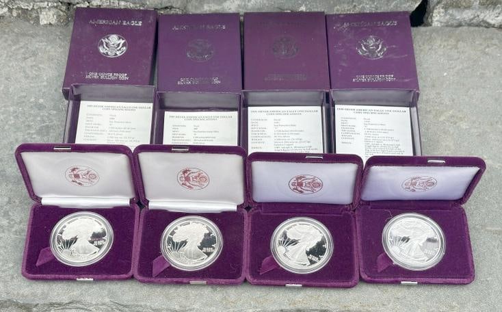 (4) fine silver AMERICAN EAGLE One Dollar coins in cases and boxes, all in fine condition, includes (1 of 1)