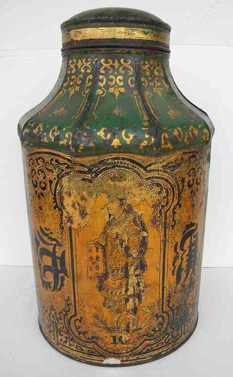 Large Chinese Tole Ware Store Tin with Graphics: Large Chinese Tole Ware Store Tin with Graphics of Man, with number 16 under him, and letters on the side. it measures about 18" high to top of lid. Has some surface rust, small paint flake on front b