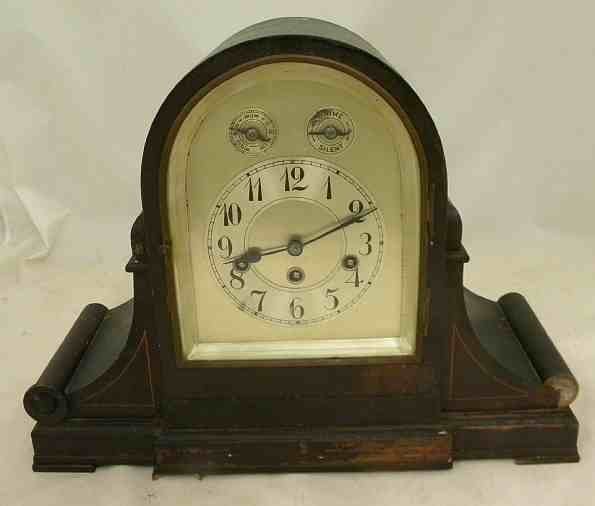 Antique JUNGHANS Westminster Chime Large MANTLE CLOCK: Antique JUNGHANS Westminster Chime Large MANTLE CLOCK, mahogany case, small piece of veneer off one corner scroll on front. Measures 18" long, by 14" high. Chimes are working, case could use a cleanin