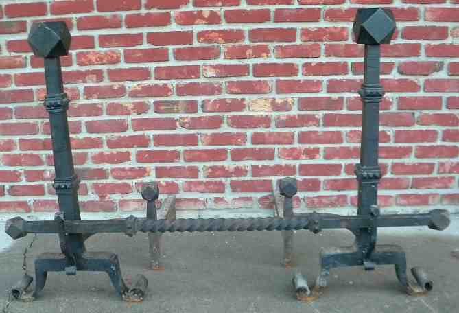 35" High Heavy Decorative Iron Andiron Set: 35" High Heavy Decorative Iron Andiron Set, from stone house in Saugerties, N.Y. In nice condition, very heavy, 35" front to back, hand wrought bar....The bar measures 55".....