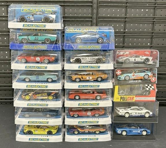 (18) slot cars in original plastic cases, in fine condition, just as we got them?..Part II of the: (18) slot cars in original plastic cases, in fine condition, just as we got them?..Part II of the over 2400 piece New England Slot Car collection we are selling, these were his pride and joy, and most